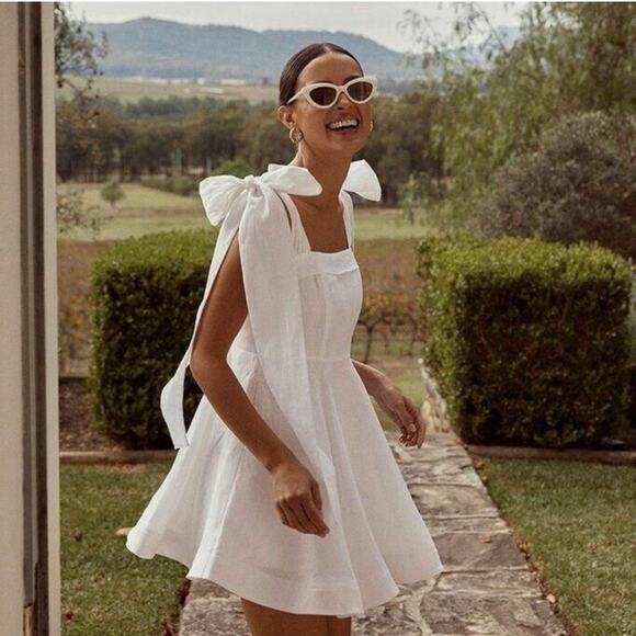 DISSH Dresses & Skirts - DISSH Aisle White 100% Linen Bow Tie Mini Dress, Sz. 4
